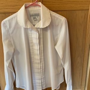 I am selling a white lace long sleeve blouse, size 10. It is cotton/polyester.